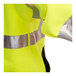 A close up of a lime green Tingley zip-up sweatshirt with reflective strips.