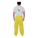 A man wearing yellow Tingley Webdri overalls.