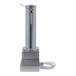 A Micro Matic stainless steel draft tower with a hose coming out of the bottom.
