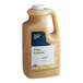 A bottle of Kelvin Slush Co. Organic Frozen Pina Colada Cocktail Mix with a white cap and label.