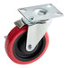 A Lavex swivel caster with a metal wheel and a red and black wheel.