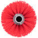 A red round brush head with long bristles.