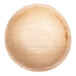 A round VerTerra palm leaf bowl with a textured surface.