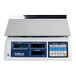 A white electronic Cas SC05P precision counting scale with a blue and black digital display.