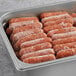 A tray of Vienna Beef Skinless Mini Beef Franks on a plate.