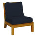 A Three Birds Casual Monterey wooden armless sectional chair with navy cushions.