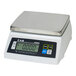A white rectangular CAS digital portion scale with a silver top.