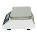 A white CAS digital portion scale with a silver top.