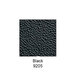 A close-up of a black surface with a textured square pattern.