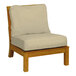 A Three Birds Casual Monterey Sand armless chair with beige cushions.