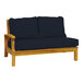 A Three Birds Casual Monterey navy blue wooden settee with black cushions.