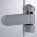 A close-up of the right hinged door handle on a Kolpak walk-in cooler.