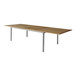 A Three Birds Casual Avanti teak dining table with an extension on a white background.