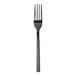 A close-up of a Oneida Chef's Table Black stainless steel dessert/salad fork with a black handle.