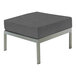 A Three Birds Casual Avanti Charcoal ottoman with metal legs.