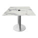 A white marble square table with a brushed aluminum base and umbrella hole.