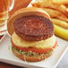 A close-up of a Before the Butcher plant-based vegan burger patty.