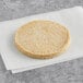 A Before the Butcher plant-based vegan chicken patty on a white napkin.