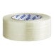 A roll of clear Lavex strapping tape with blue and white text.