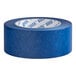 A roll of Lavex blue painter's tape with white writing on it.