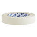 A pack of 6 Lavex white masking tape rolls.