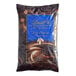 A white bag of Lindt Alpina dark chocolate Piccoli baking chips.