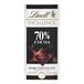 A Lindt Excellence 70% Cocoa Dark Chocolate bar in a white wrapper with a black and white label.