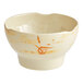 A white bowl with brown and orange designs.