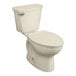 An American Standard white vitreous china toilet with a silver handle and the seat down.