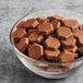 A bowl of Lindt milk chocolate piccoli pieces.