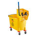 A yellow Lavex mop bucket with black wheels and a side press wringer.