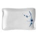 A white rectangular plate with blue and white speckled designs.