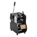 A black and silver Galaxy Manual Bubble Tea Sealing Machine with a roll of paper on top.