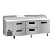 A stainless steel Hoshizaki pizza prep table counter with four drawers.