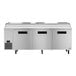 A Hoshizaki stainless steel refrigerated pizza prep table with three doors.