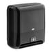 A black Tork Elevation Matic hands-free paper towel dispenser.