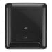 A black Tork Matic wall-mount paper towel dispenser.