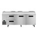 A stainless steel Hoshizaki commercial pizza prep table with two drawers and two doors.