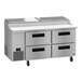 A Hoshizaki refrigerated pizza prep table with four drawers on a stainless steel counter.