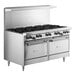 A large stainless steel Garland commercial gas range with 10 burners and 2 convection ovens.