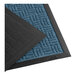 A close-up of a blue and black Lavex parquet carpet entrance mat.