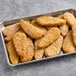 A tray of Dr. Praeger's Plant-Based Vegan Chick'n Tenders.