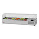 A Turbo Air refrigerated countertop salad prep table with a clear hood full of vegetables and salads.