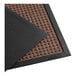 A brown Lavex waffle indoor entrance mat with black edges.