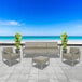 A BFM Seating Belmar armchair with a sea salt green cushion on a white background.