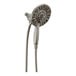 A Delta stainless steel shower head with a hand held shower head on a hose.