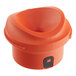 An orange Bunn carafe lid with a black button.