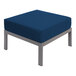 A BFM Seating Belmar gray metal ottoman with a Sunbrella Abyss blue cushion on a white surface.