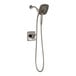 A Delta stainless steel shower head with a hand held shower head on a hose.