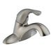 A stainless steel Delta deck-mount lavatory faucet with a single handle.